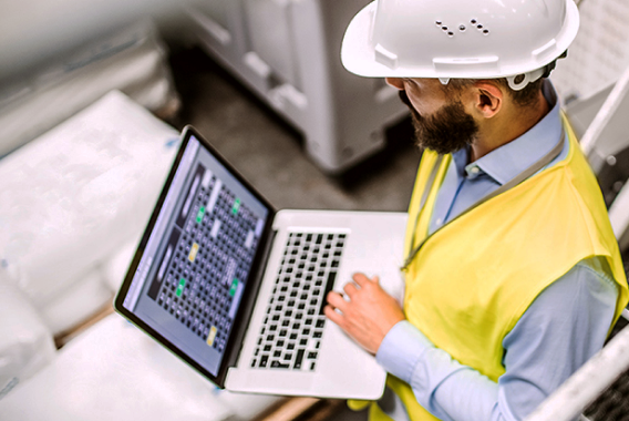 Smart building internet worker on laptop Smart building internet worker on laptop