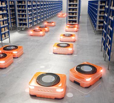 Orange robot carriers in modern warehouse, 3D rendered image.